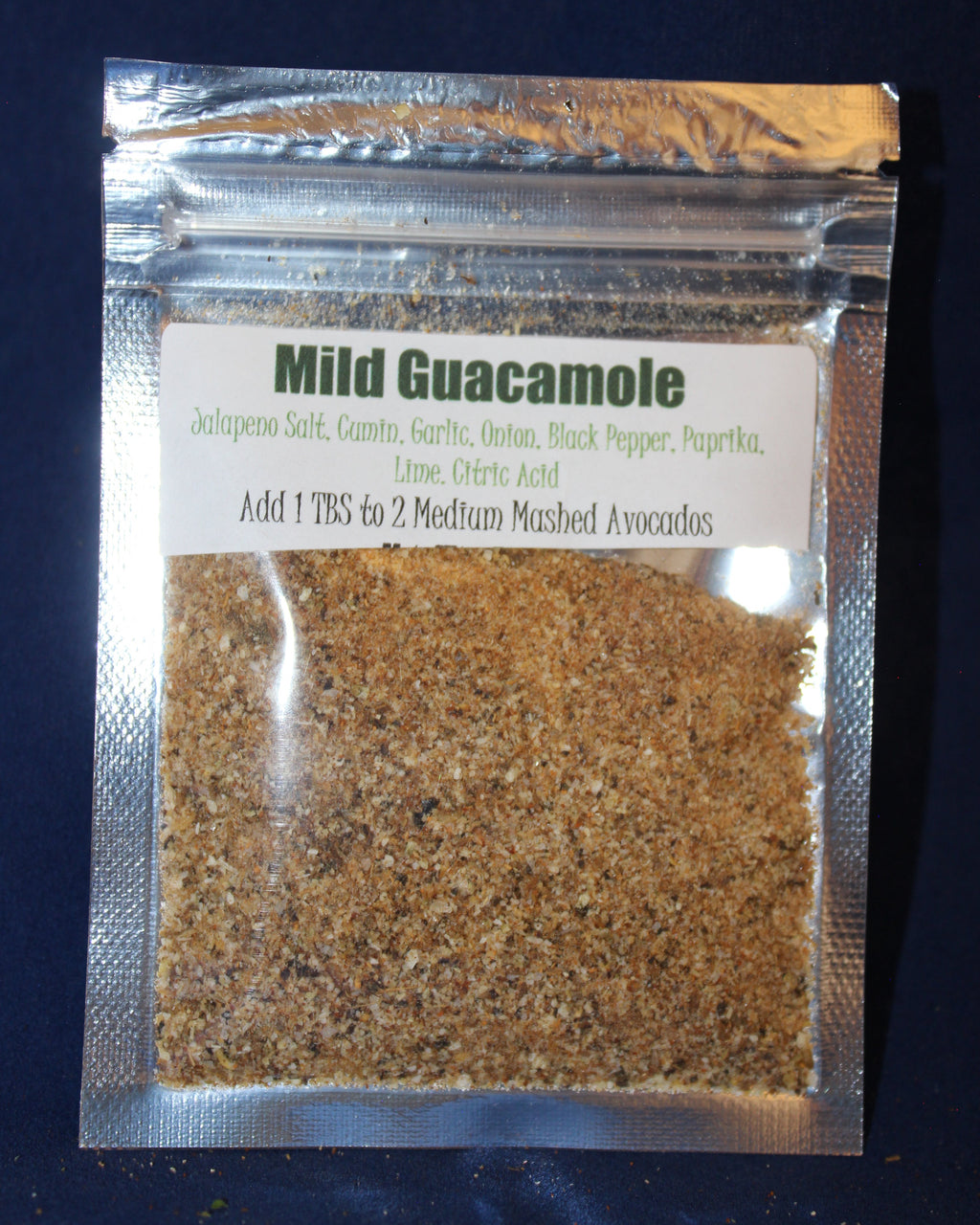Mild Guacamole spice mix packaging on a dark background