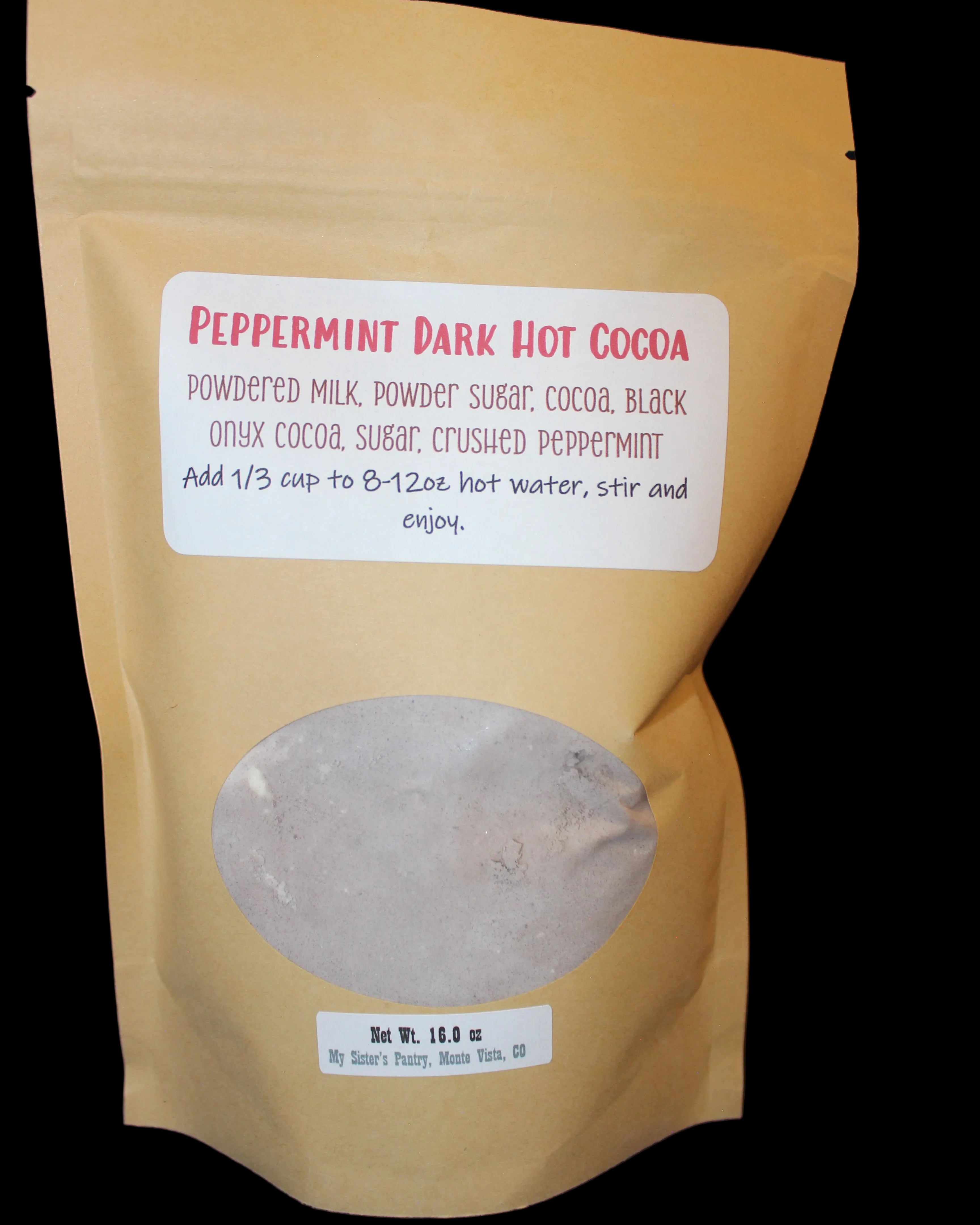 Package of peppermint dark hot cocoa with a label on a dark background