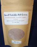 Package of Sweet Vanilla Hot Cocoa with a label on a dark background