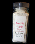 Jar of vanilla sugar with a label on a dark blue background