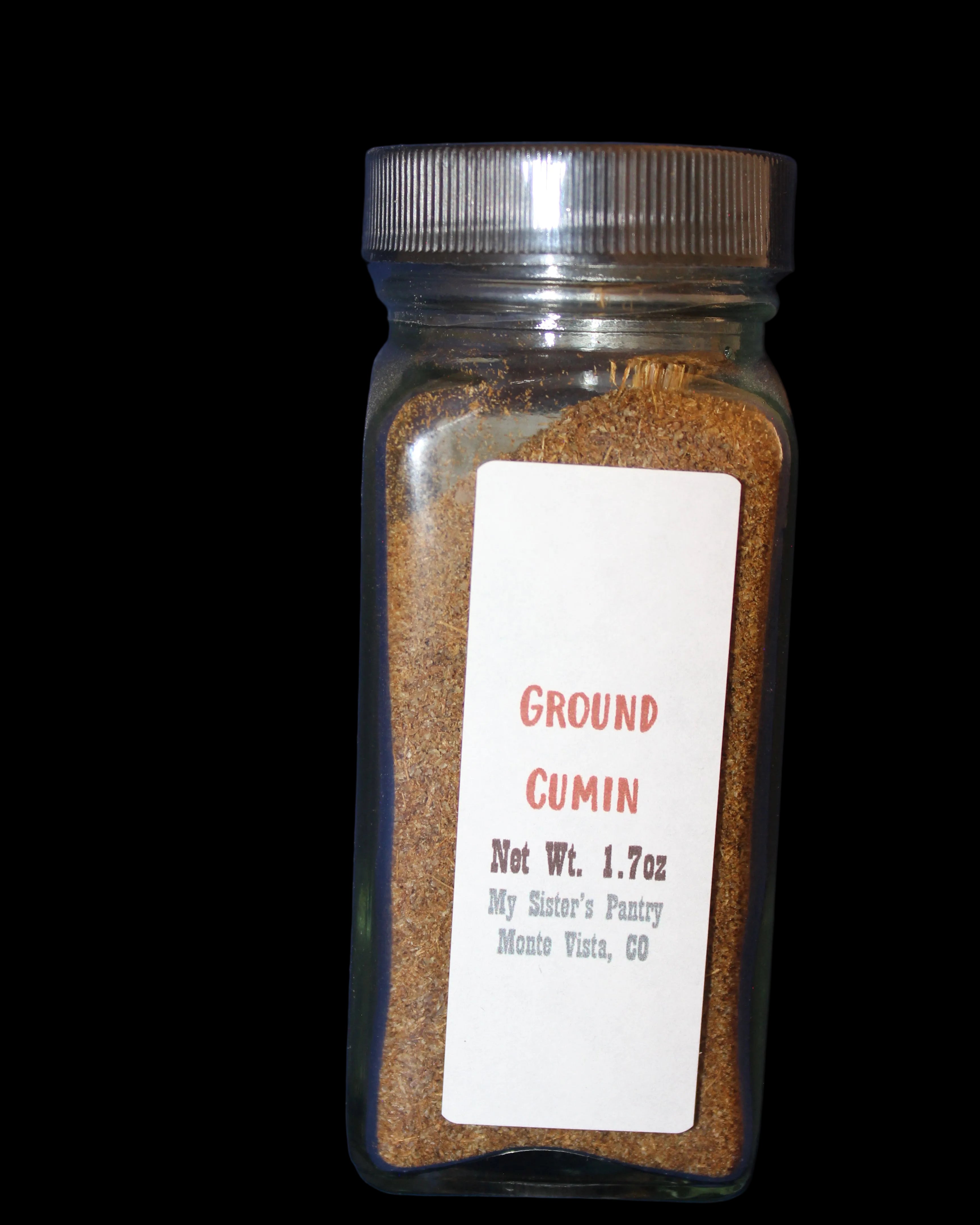 Jar of ground cumin with a label