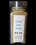 Jar of ground white pepper with a label 