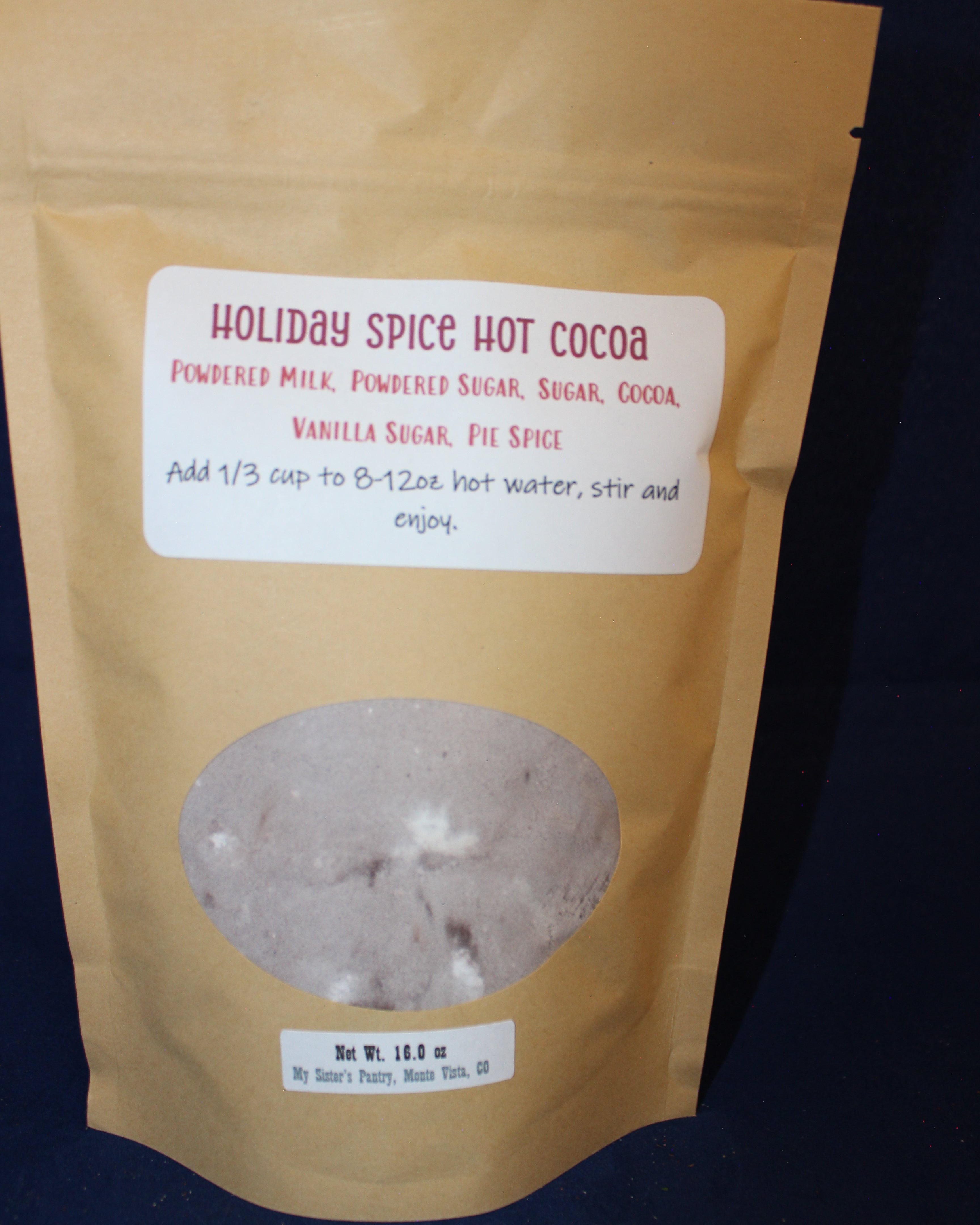 Large Package of holiday spice hot cocoa with a label 